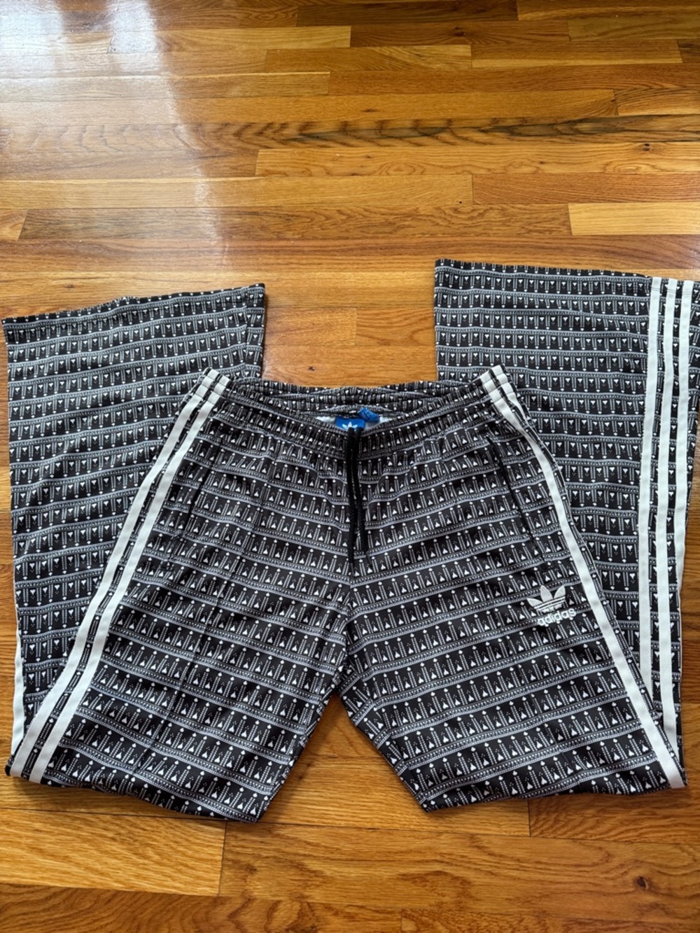 adidas woman’s bell bottom Joggers with White Side Stripes